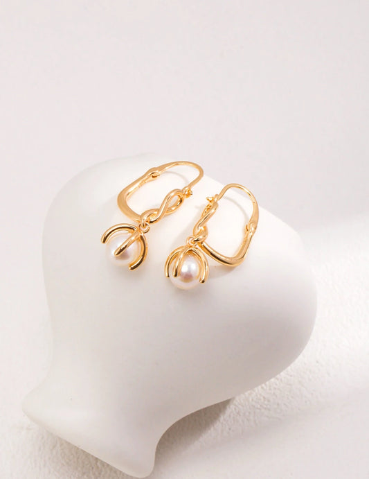 Iris Gold Pearl Dangles Earrings